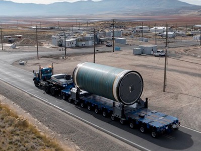 rocket motor segment being transported on flat bed truck