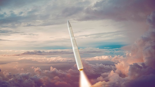 missile launch through cloudy sky