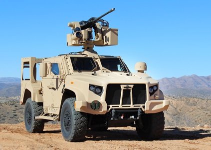 military vehicle with weapon mounted on roof