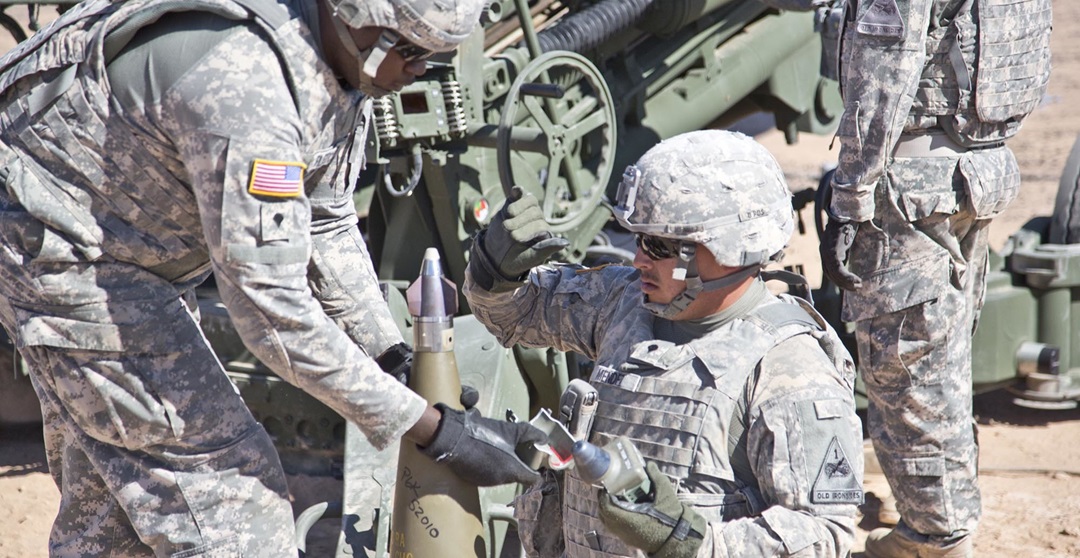 soldiers working with guided projectiles