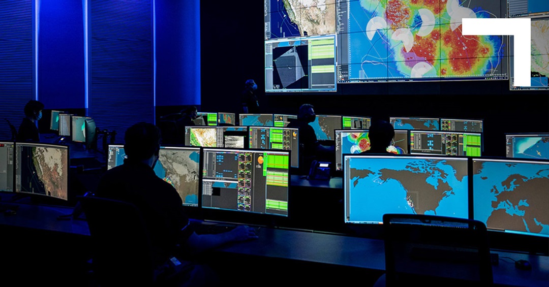 situation room with multiple monitors