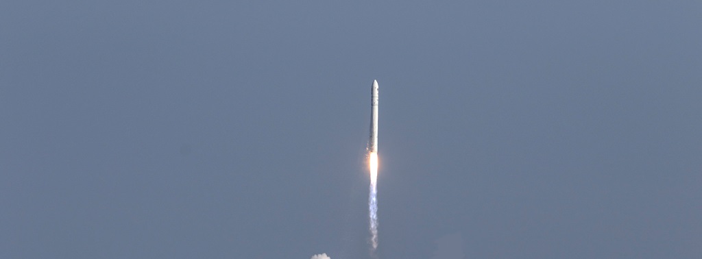 The Antares rocket launches in the sky