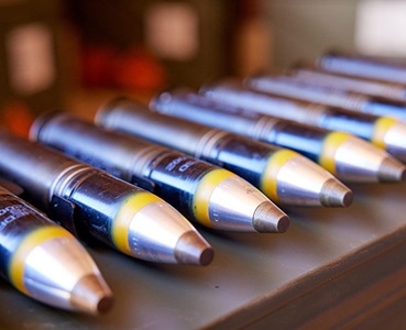 gun ammunition lined-up in a row