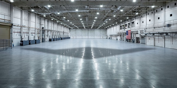 shadow of aircraft in large hangar