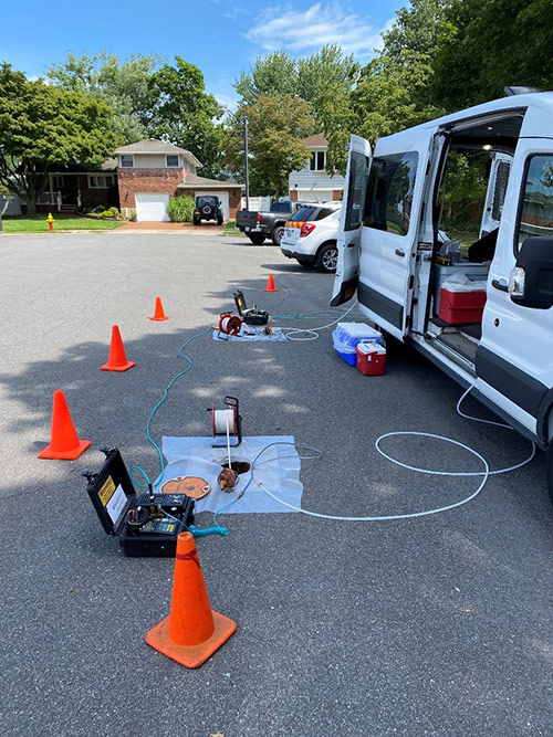 Typical set-up of Northrop Grumman/US Navy groundwater sampling operations on a residential street