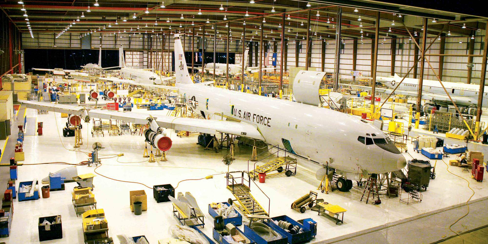 large military plane in modernization hangar