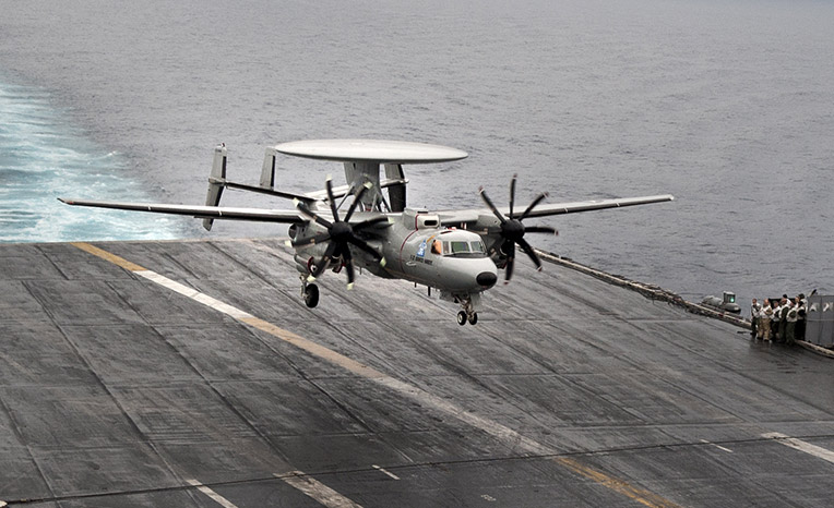 E-2D Advanced Hawkeye landing on the deck of aircraft carrier
