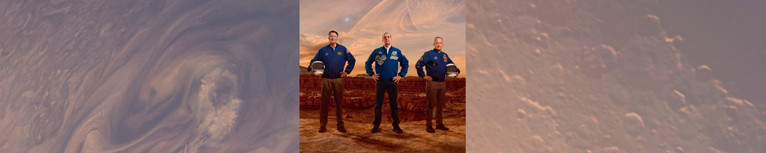 Three astronauts standing in a line