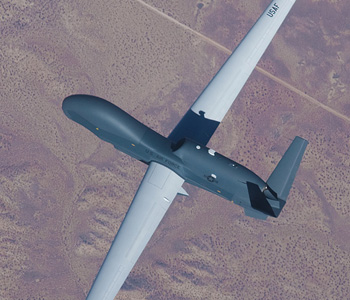 Top view of Global Hawk flying above a terrain