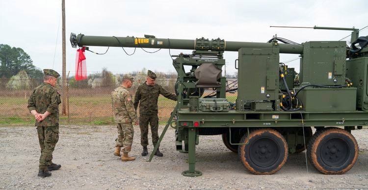 servicemembers inspect the Integrated Battle Command System