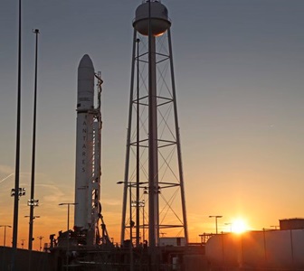 rocket on launch pad during sunset