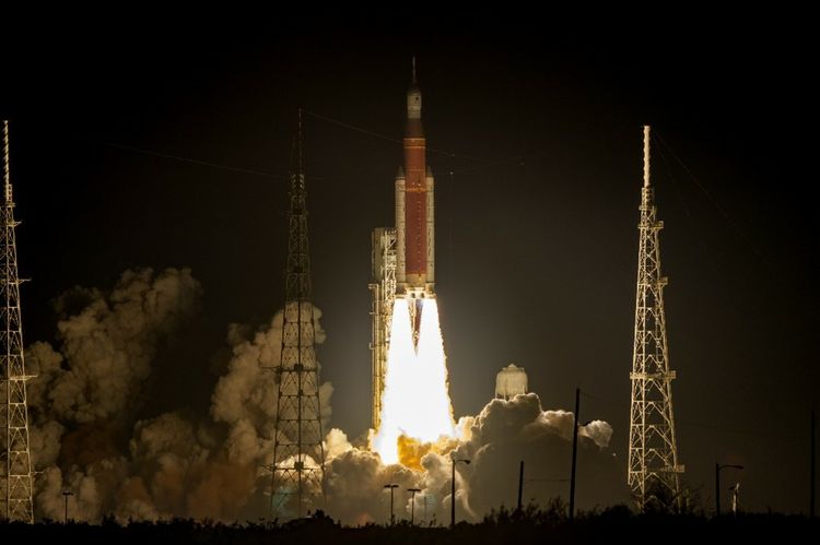 Artemis rocket launch at night