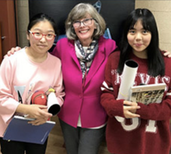 teacher and 2 students in Korea
