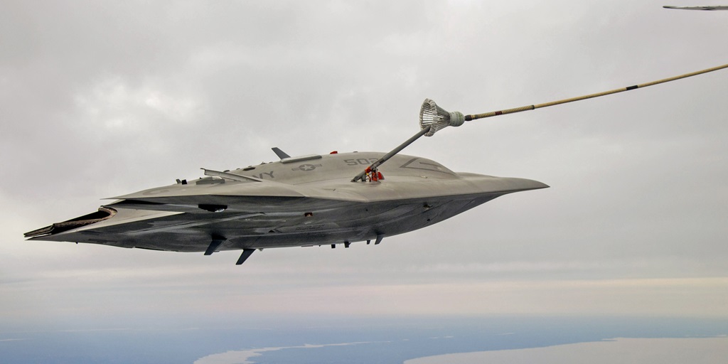 X-47B UCAS flying and being refueled by another aircraft carrying fuel
