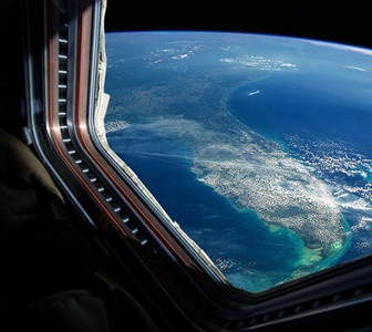 space ship window looking at earth