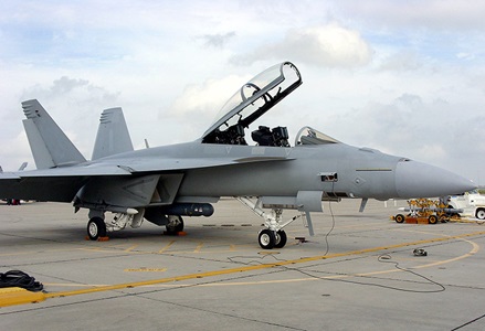 military jet sitting on runway